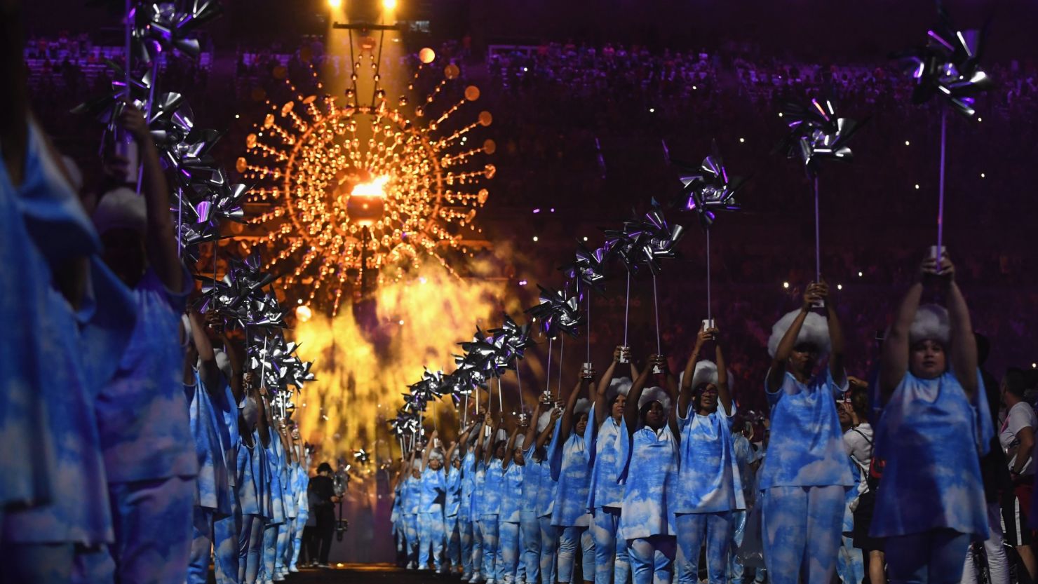 Sunday's closing ceremony was a joyful extravaganza of music and dance, tinged with sadness.