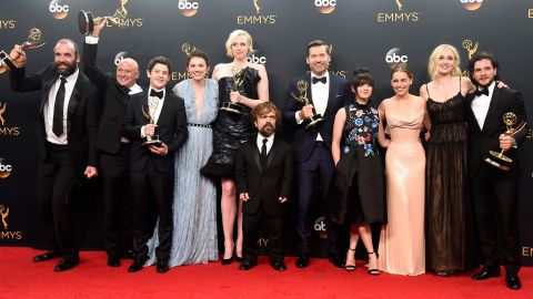 The cast of the "Game of Thrones" celebrate their win for Best Drama Series.