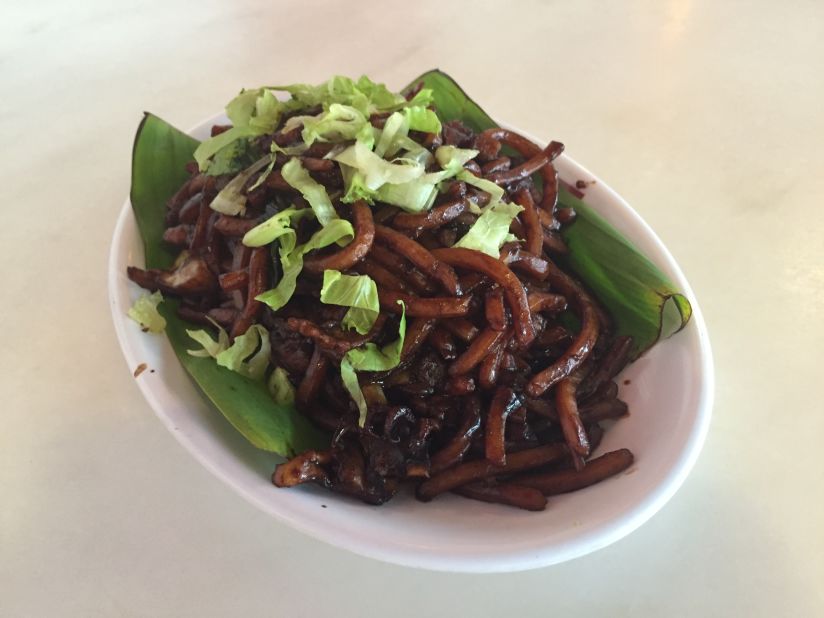 The dark sweet soy sauce used in Kam Lian Kee's Hokkien fried noodles masks all the other ingredients -- like pork, prawns, squid, cabbage and tiny bits of crispy pork skin -- so you're surprised with the rich taste of every bite.