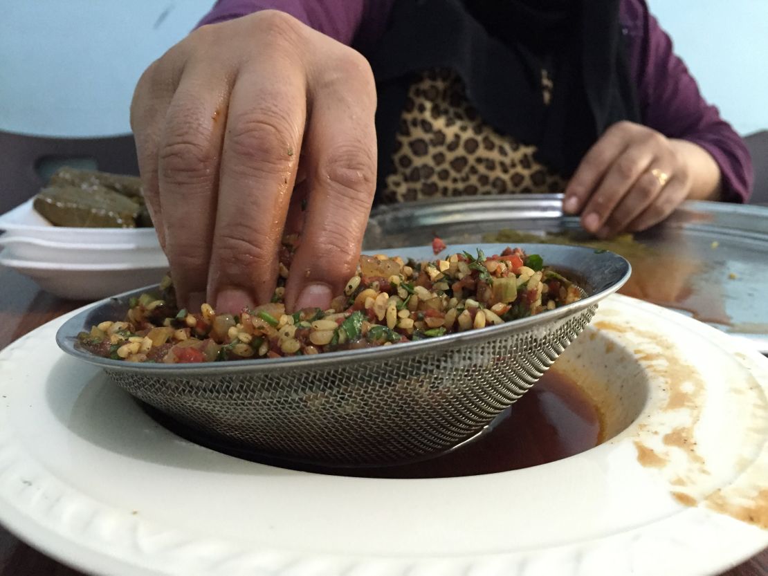 The stuffed grape leaves are filled with rice, herbs, spices and pomegranate sauce