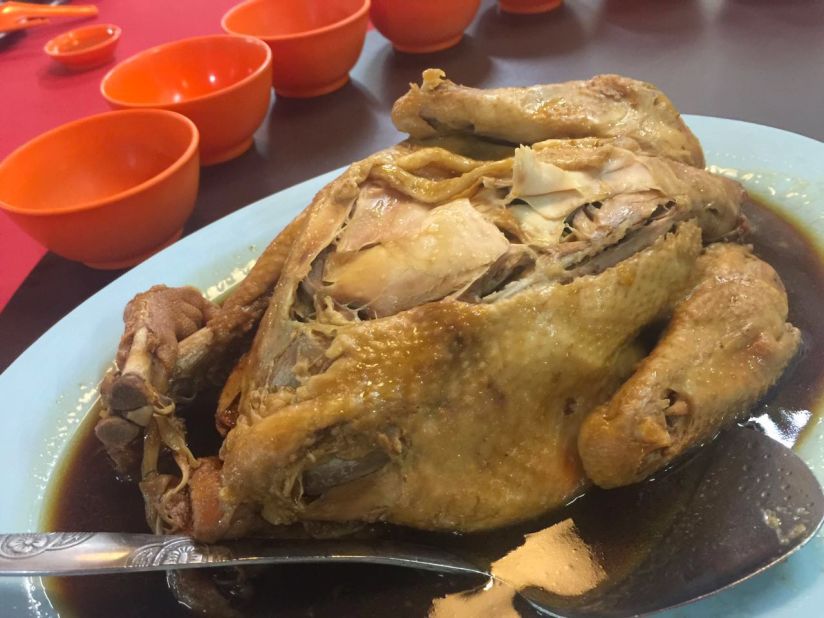 This fresh chicken is marinated in Chinese medicinal herbs and Shaoxing cooking wine, then covered in clay and buried in a kiln and slowly roasted for six hours.
