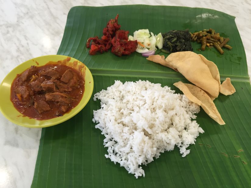 The authentic way to eat this traditional South Indian banana leaf cuisine -- as served in KL's Bangsar -- is to use your hands.