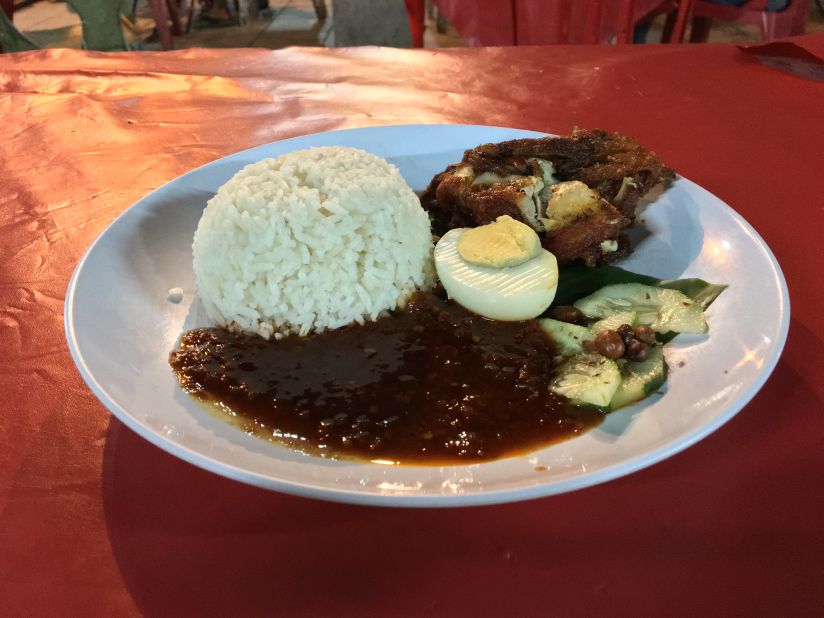 Nasi Lemak, a popular dish served at Nasi Lemak Famous, literally translates into "fatty rice."
