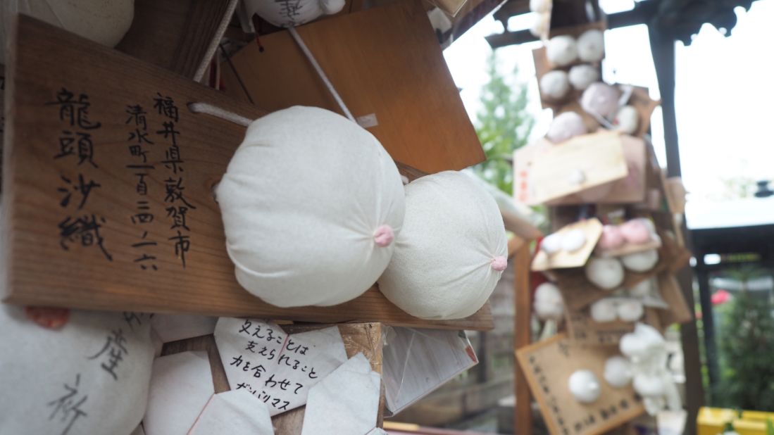 The temple's head priest says visitors come to pray for various women's health issues. For instance, some of the offerings might represent prayers that a loved one will recover from breast cancer. Others may have been hung by a women hoping for a safe pregnancy. 