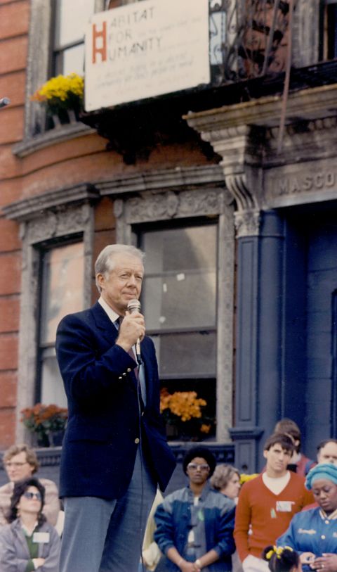 Jimmy Carter speaks outside the first Jimmy & Rosalynn Carter Work Project in New York City in 1984.
