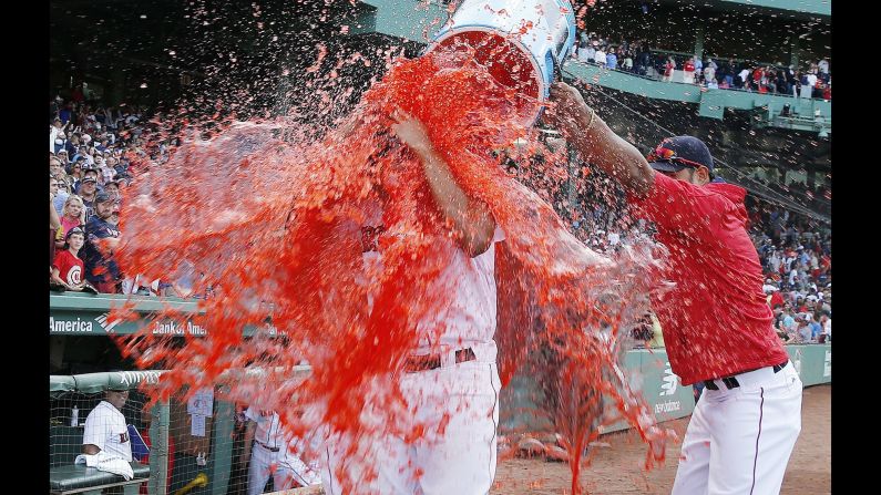 Xander Bogaerts is doused by his Boston Red Sox teammates after a home win over the New York Yankees on Saturday, September 17. Bogaerts had a home run in the game and three RBIs.