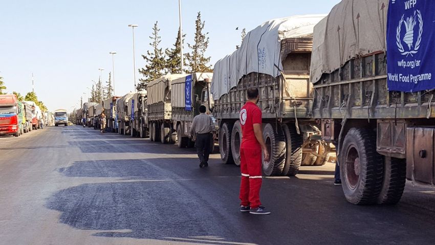 Syrian Red Crescent delivering aid convoy of 31 trucks heading out to reach the western rural side of Aleppo (before being attacked by airstrikes).