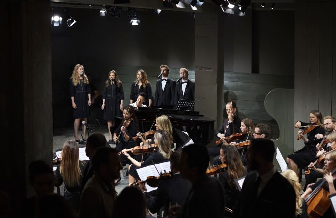 Models walked to the live soundtrack of a 21-piece orchestra that, accompanied by pianist Rosey Chan and vocalists, performed 'Reliquary' -- a score written by British composer Ilan Eshkeri, exclusively for the show. 