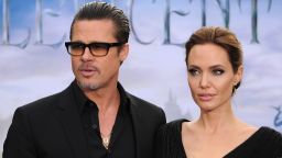 Brad Pitt and Angelina Jolie attend a private reception as costumes and props from Disney's "Maleficent" are exhibited in support of Great Ormond Street Hospital at Kensington Palace on May 8, 2014 in London, England.  