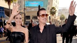 Actors Angelina Jolie and Brad Pitt attend the World Premiere of Disney's "Maleficent" at the El Ca