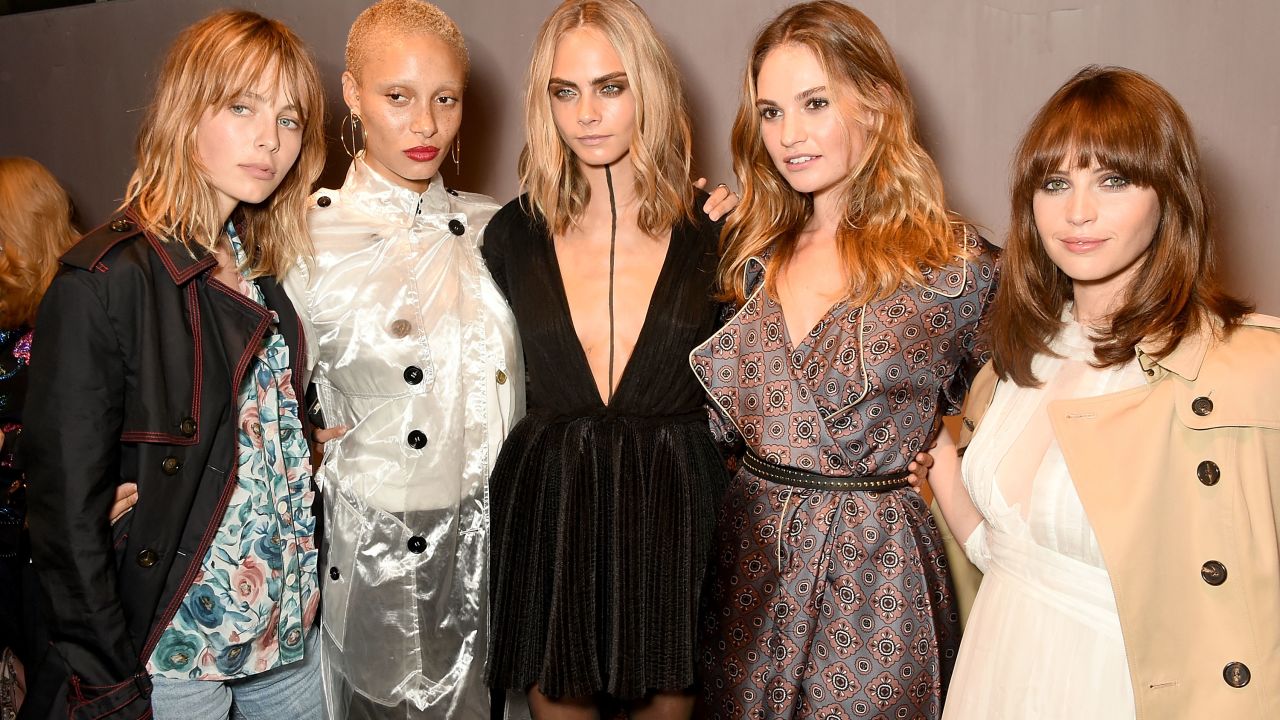 LONDON, ENGLAND - SEPTEMBER 19:  (L-R) Edie Campbell, Adwoa Aboah, Cara Delevingne, Lily James and Felicity Jones wearing Burberry at the Burberry September 2016 show during London Fashion Week SS17 at Makers House on September 19, 2016 in London, England.  (Photo by David M. Benett/Dave Benett / Getty Images for Burberry) *** Local Caption *** Edie Campbell; Adwoa Aboah; Cara Delevingne; Lily James; Felicity Jones