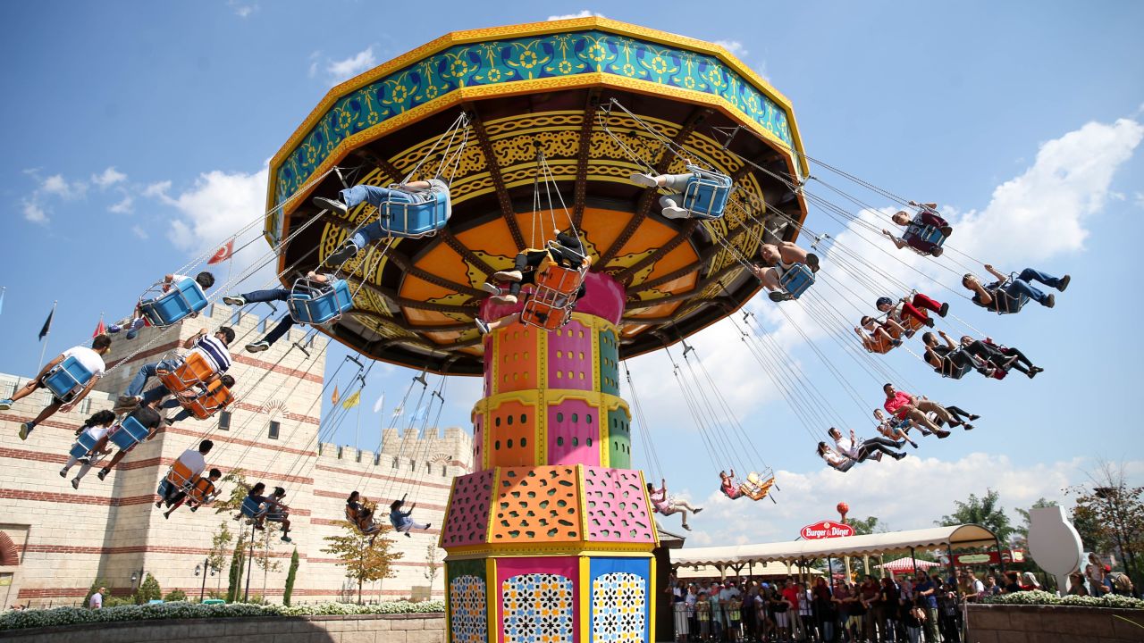 Eid Al-Adha is a festival of fun as well as significant day in the Muslim calendar. In Istanbul, it's an excuse to hit the rides, including this colorful retro swing spinner, at an amusement park.