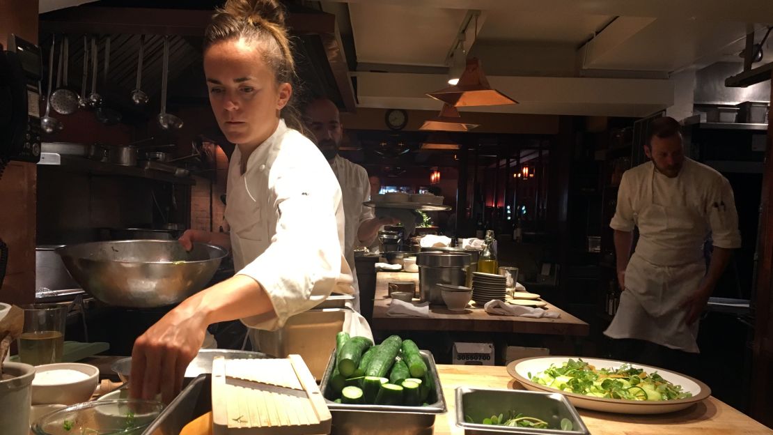 Restaurant cook Phoebe Halsey at work. 