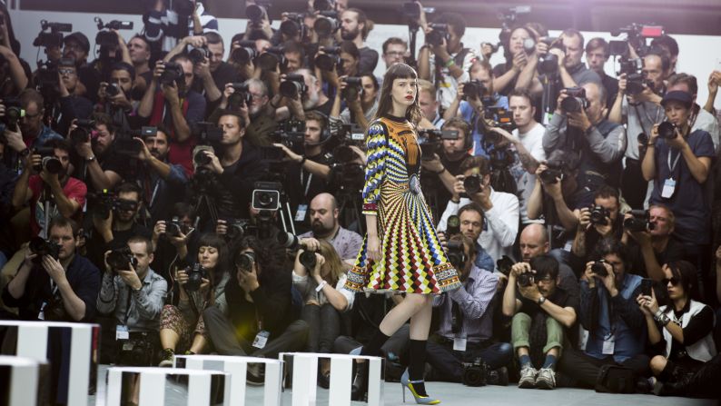 Who's photographing the photographers? The pursuit of beautiful photos can be an ugly business. We sent Suzanne Plunkett into the pit at London Fashion week to expose the underbelly of an industry that requires sharp eyes -- and sharper elbows.<br /><br /><strong>Pictured: </strong>Photographers shoot the Mary Katrantzou catwalk show during London Fashion Week, September 18, 2016. <br />