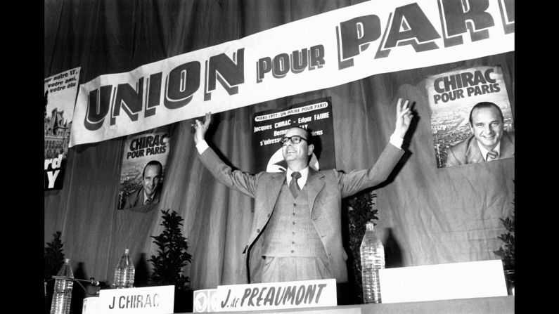 Chirac responds to cheers after being elected mayor of Paris in 1977.