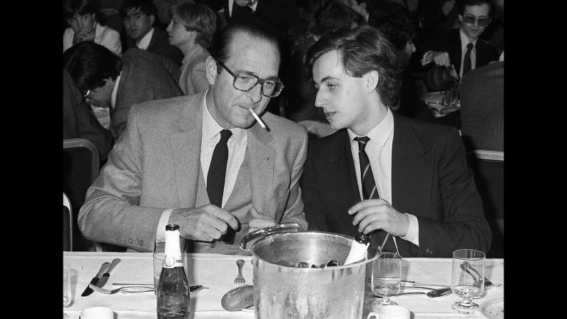 Chirac speaks with future French President Nicolas Sarkozy in 1981. At the time, Sarkozy was a fellow party member in charge of youth but would later become his rival, winning the presidential race after Chirac's retirement from politics in 2007.