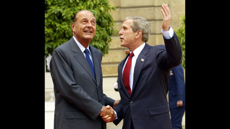 Chirac and U.S. President George W. Bush greet each other in Paris and look at the stormy skies overhead in 2002. Chirac was perhaps best known for his staunch opposition to the war in Iraq -- a position that put him at odds with Bush. Chirac's opposition to the war made him -- and his nation -- the target of criticism and even ridicule in the U.S., with French products and companies boycotted, and French fries replaced by "Freedom fries."