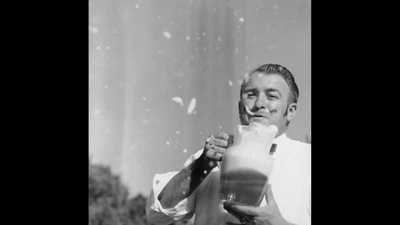 A man drinks a stein of beer at an Oktoberfest event in Monterey, California, in 1958. Many other countries put on their own Oktoberfest celebrations in honor of the main event in Germany.