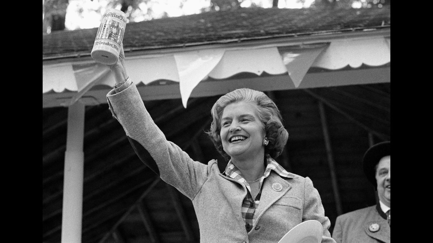 U.S. first lady Betty Ford holds a beer mug she received at an Oktoberfest event in Milwaukee in 1976.