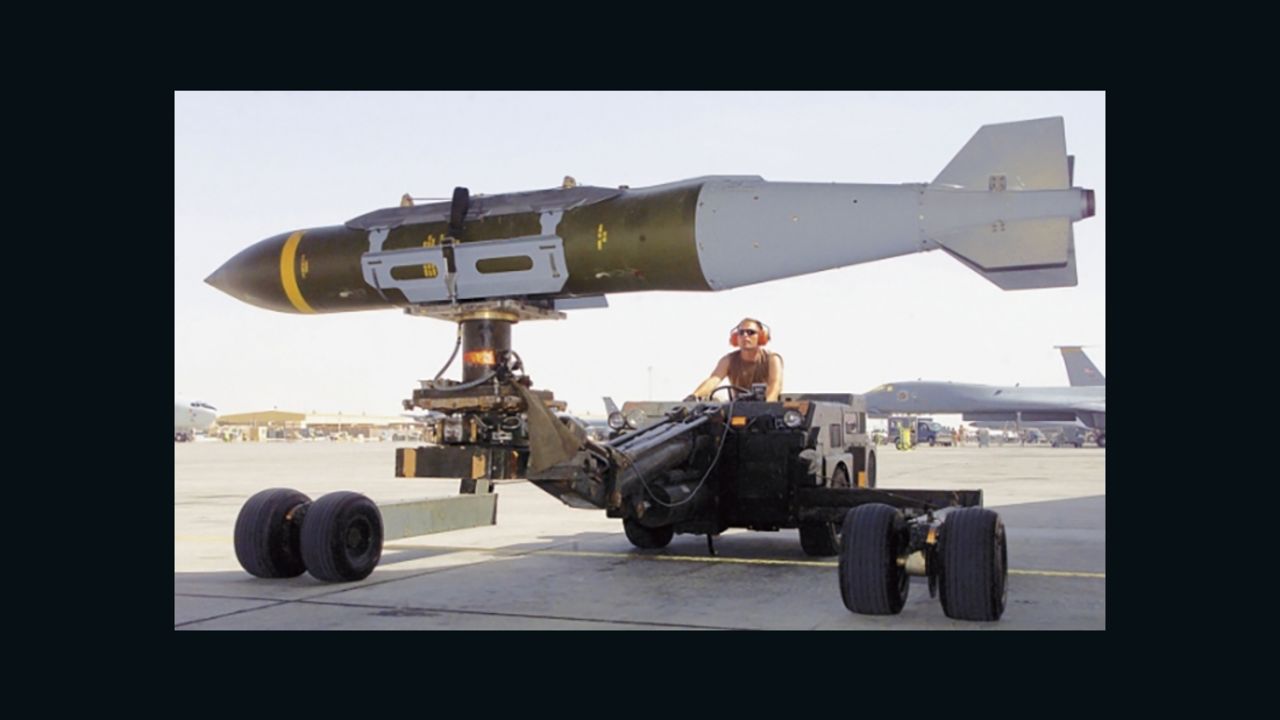 A GBU-31(V)3/B 2,000 lb penetrator is loaded into the weapons bay of a USAF B-1B during combat operations over Iraq in 2003.