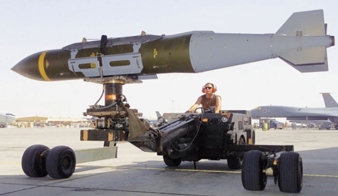 A GBU-31(V)3/B 2,000 lb penetrator is loaded into the weapons bay of a USAF B-1B during combat operations over Iraq in 2003.