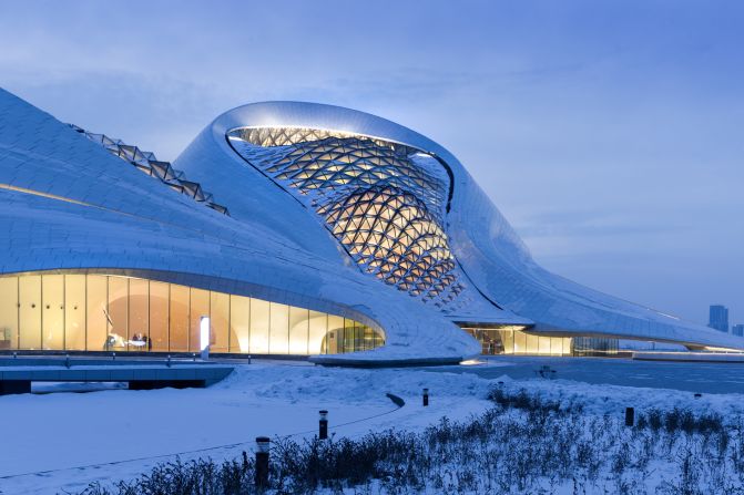 Completed in 2015, the Harbin Opera House in northern China occupies an area of over 850,000 square feet. The theater is partially lit by a faceted skylight, which was designed to subtly mark the time that passes during opera performances.