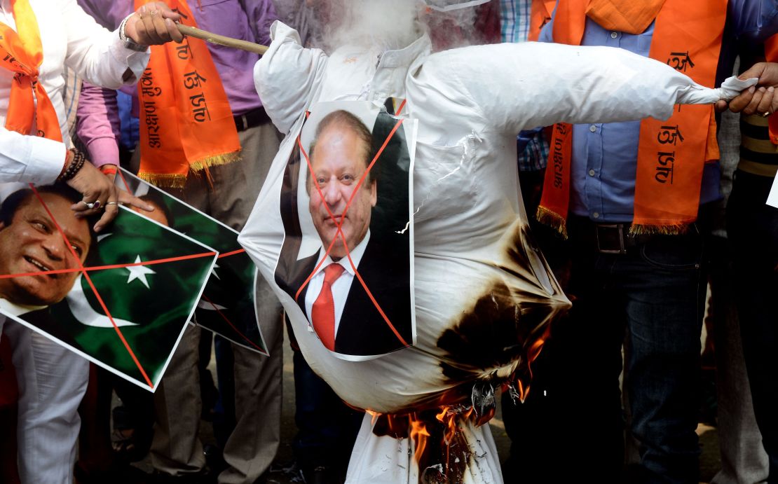 Indian activists burn an effigy of Pakistan's Prime Minister Nawaz Sharif during a protest against Pakistan, in New Delhi  September 19, 2016.