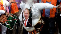 Indian right-wing activists burn an effigy of Pakistan's Prime Minister Nawaz Sharif during a protest against Pakistan, in New Delhi on September 19, 2016. India on September 19 weighed its response to a bloody raid on an army base in Kashmir which  fuelled tensions with nuclear-armed Pakistan, as some politicians called for military action after the worst attack of its kind in over a decade. New Delhi has said that Pakistan-based militants were behind the September 18 attack in which 17 soldiers were killed, raising the prospect of a military escalation in the already tense disputed Himalayan region.
 / AFP / MONEY SHARMA        (Photo credit should read MONEY SHARMA/AFP/Getty Images)