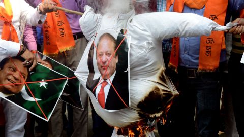 Indian activists burn an effigy of Pakistan's Prime Minister Nawaz Sharif during a protest against Pakistan, in New Delhi  September 19, 2016.