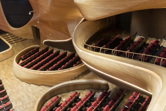 Curvature is a defining feature of the building, which welcomes visitors who aren't necessarily there to see an opera.