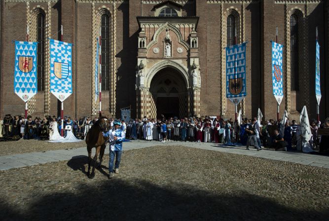 A horse and jockey are blessed outside Asti Cathedral ahead of the 2016 Palio on September 18.