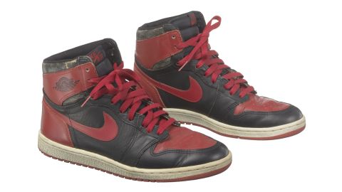 Basketball star Michael Jordan made his Nike Air Jordan shoes a hot commodity. This pair of size 13 red and black Air Jordan I high top sneakers is from 1985, a year after he starting playing for the Chicago Bulls. 