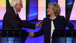 Democratic presidential candidates U.S. Sen. Bernie Sanders and Hillary Clinton shake hands at the end of a presidential debate sponsored by CNN and Facebook at Wynn Las Vegas on October 13, 2015 in Las Vegas, Nevada.