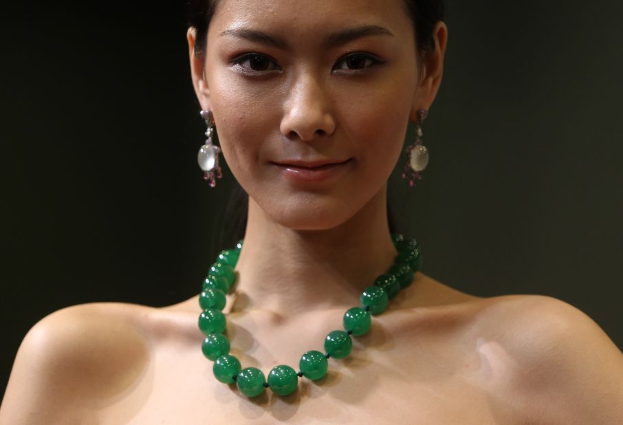 This jadeite bead necklace, shown here during an auction preview in Hong Kong, sold for $13.7 million at a Tiancheng International auction held in Hong Kong on Novermber 28, 2012.   