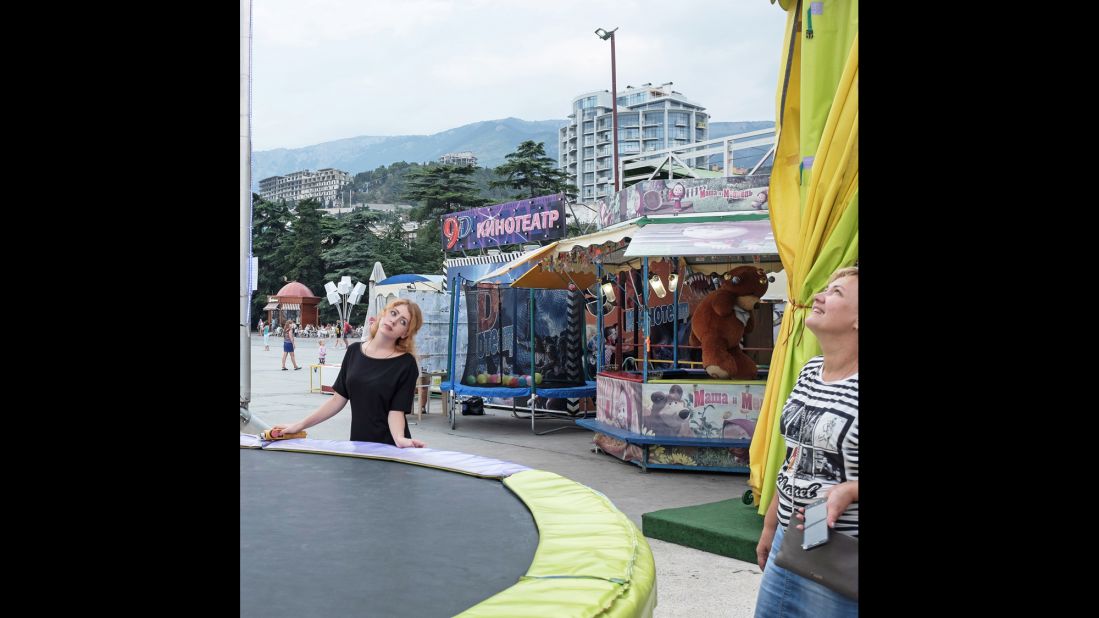 Booths are set up at a fair on Yalta's Lenin Promenade.