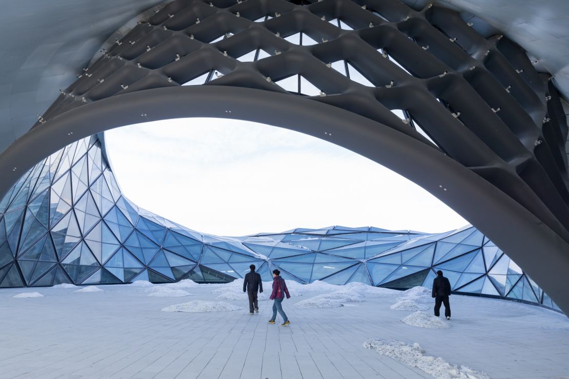 The Harbin Opera House's outdoor spaces feel like extensions of the snowy surrounds.