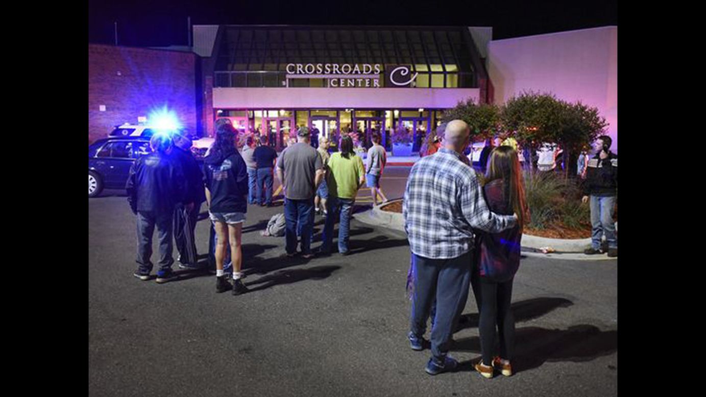 People stand near an entrance of the Crossroads Center mall after <a href="http://www.cnn.com/2016/09/19/us/minnesota-mall-stabbing/" target="_blank">multiple people were stabbed</a> there Saturday, September 17, in St. Cloud, Minnesota. Dahir Adan is suspected of storming the mall and injuring 10 people before he was shot dead by an off-duty police officer.
