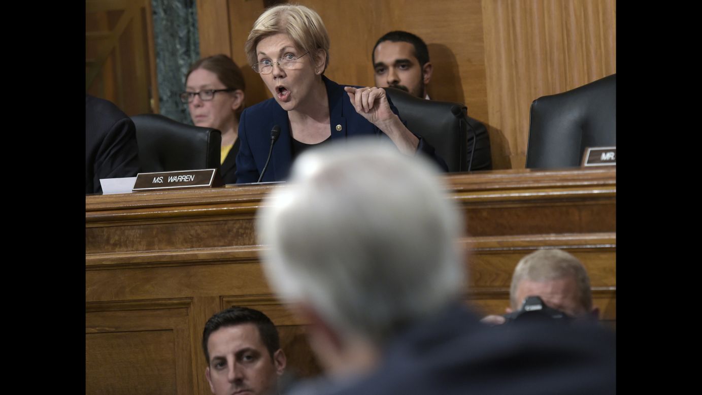 U.S. Sen. Elizabeth Warren, a member of the Senate Banking Committee, questions Wells Fargo CEO John Stumpf in Washington on Tuesday, September 20. Warren <a href="http://money.cnn.com/2016/09/22/investing/wells-fargo-elizabeth-warren-fair-labor-firings/" target="_blank">unleashed a verbal barrage at Stumpf,</a> calling the embattled bank boss "gutless" and demanding he step down. Her diatribe was the most forceful condemnation yet of Wells Fargo, who fired more than 5,000 employees over the years for creating fake accounts without customer knowledge. The employees created the fraudulent accounts to meet bank quotas and were allegedly threatened with firing if they didn't comply.