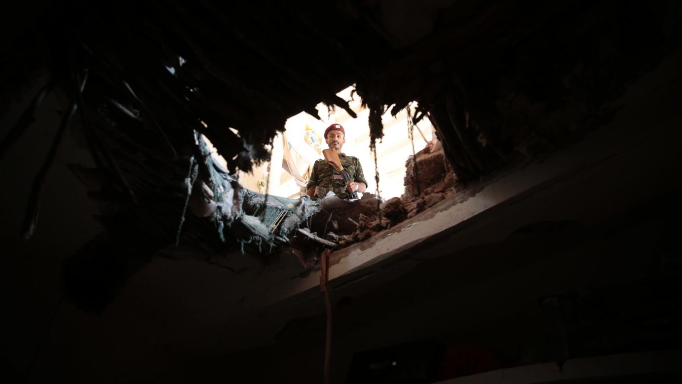 A soldier looks through a damaged building in Sanaa, Yemen, after an airstrike by the Saudi-led coalition on Tuesday, September 20. Yemen's Houthi rebels, who are Shiite, <a href="http://www.cnn.com/2016/01/18/middleeast/yemen-violence/" target="_blank">rebelled last year</a> against the Sunni-led government of President Abdu Rabu Mansour Hadi, which is backed by Saudi Arabia. Saudi Arabia got involved by launching airstrikes against rebel targets in Yemen. 
