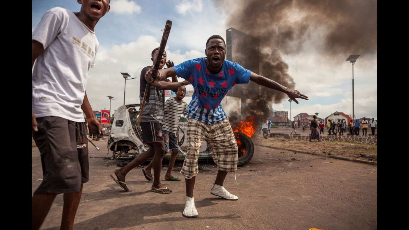 Demonstrators gather in front of a burning car during an opposition rally in Kinshasa, Democratic Republic of Congo, on Monday, September 19. The government<a href="http://www.cnn.com/2016/09/19/africa/congo-unrest-protests/" target="_blank"> is urging calm</a> following protests that led to at least 17 deaths. The protesters are upset with the national electoral commission's failure to announce a timetable for the presidential election, which is due to take place in November.