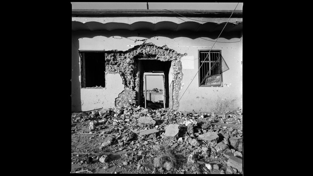 The entrance to a heavily damaged house in Sinjar. Voeten has covered wars for about 25 years, but he said this was "destruction on a scale I have rarely witnessed before."