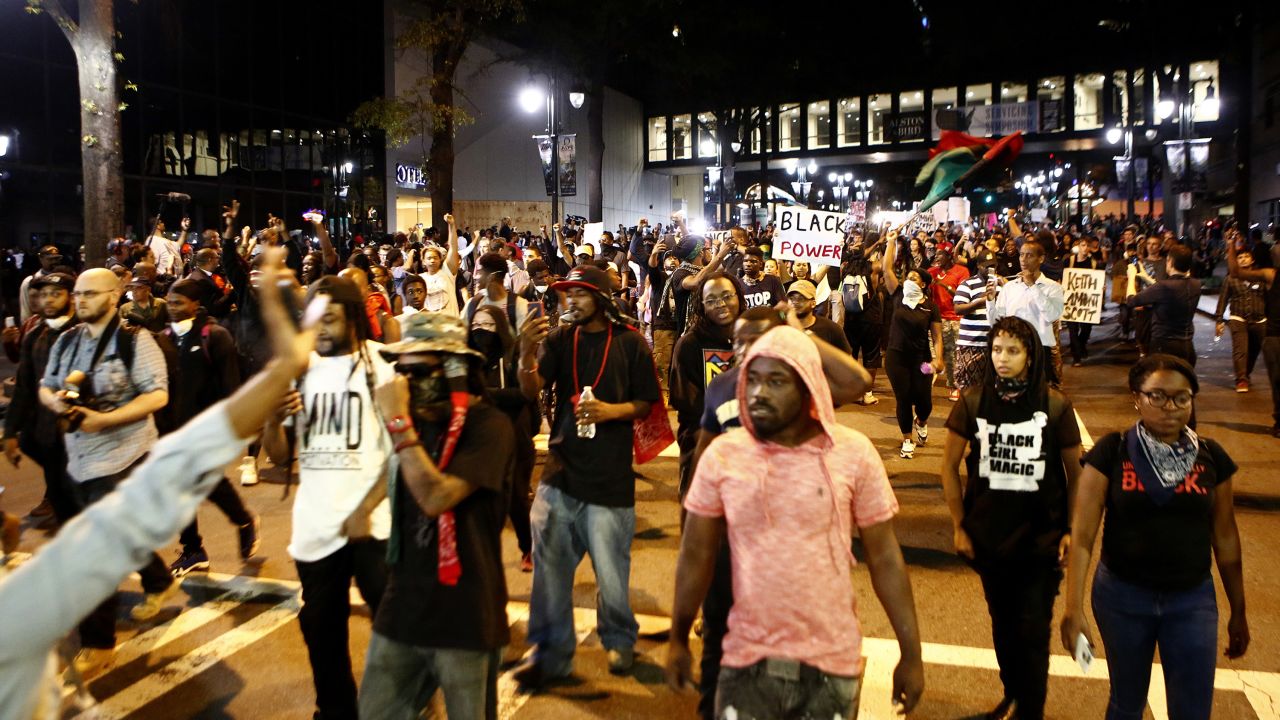 Residents and activists march in the streets of Charlotte on September 22. There was a heavy police presence, and the National Guard was also on hand.