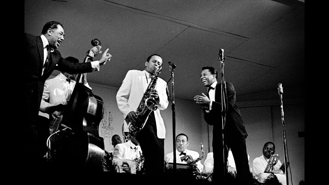 Duke Ellington, left, performs with saxophonist Paul Gonsalves, center, at the Monterey Jazz Festival in 1960.