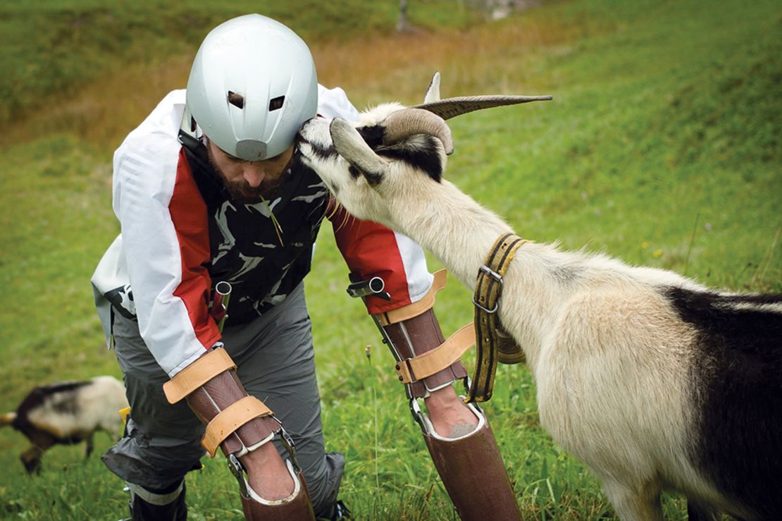 Goat man Thomas Thwaites bonds with an actual goat in the Alps.