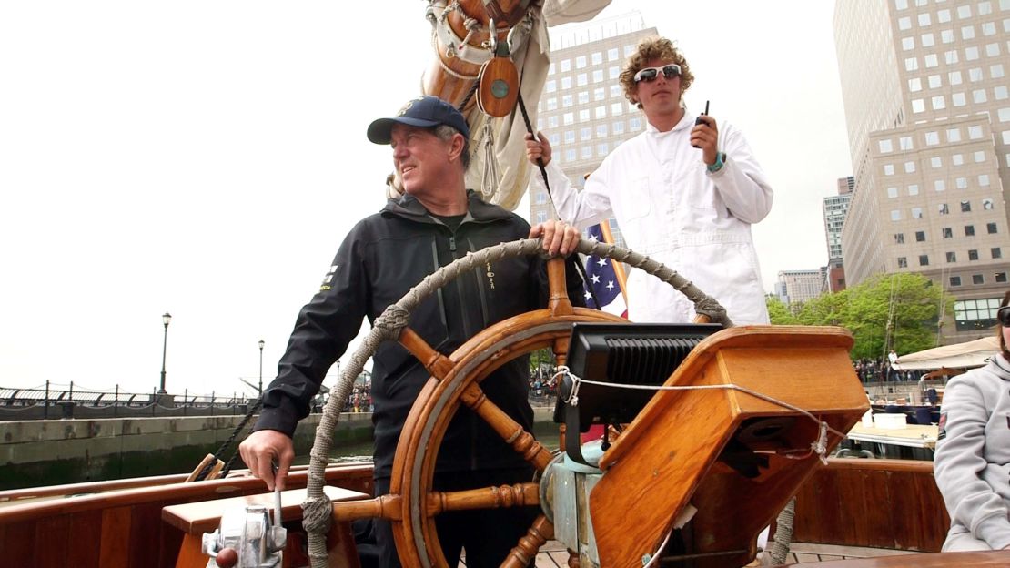 Troy Sears at the helm of America, with Chris Childers in support.