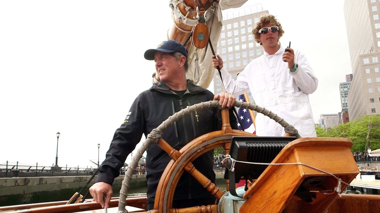Troy Sears at the helm of America, with Chris Childers in support.