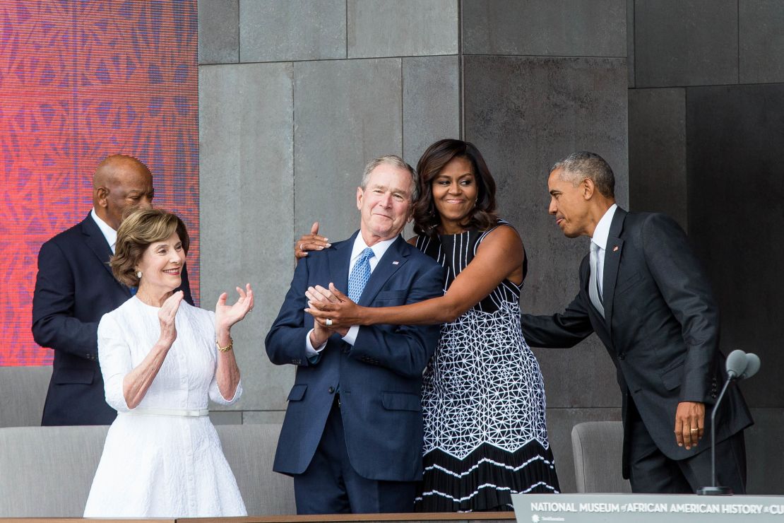 Former US First Lady Laura Bush, former US President George W. Bush, First Lady Michelle Obama, and President Barack Obama attend the opening ceremony for the Smithsonian National Museum of African American History and Culture on September 24, 2016 in Washington, D.C. 