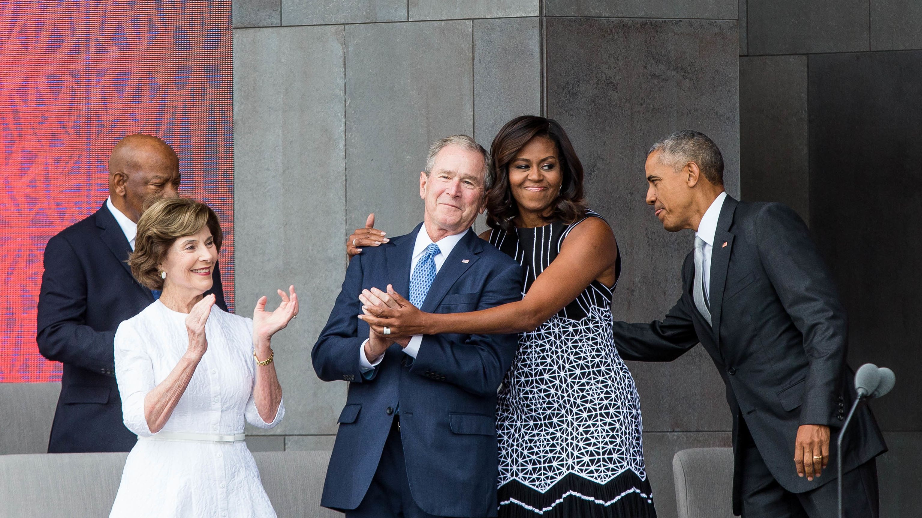 Former first lady Laura Bush, former President George W. Bush, first lady Michelle Obama and President Barack Obama attend the opening ceremony for the Smithsonian National Museum of African American History and Culture on September 24, 2016, in Washington. 