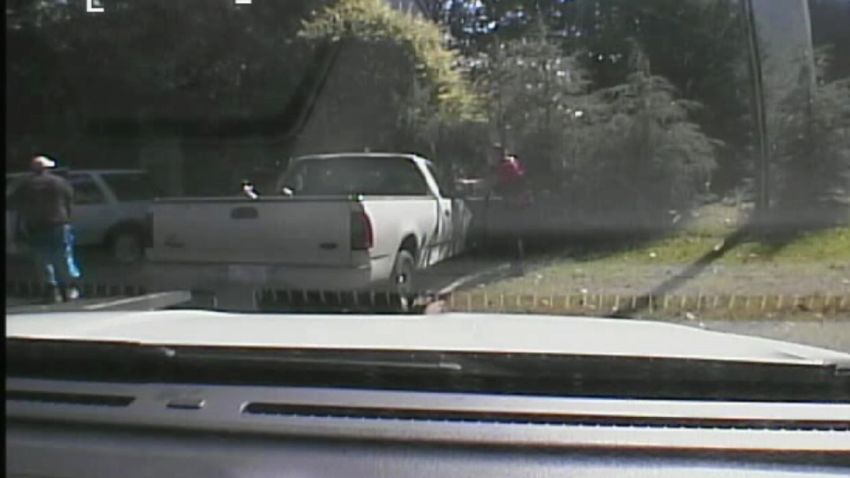 An image taken from dashcam video released by the Charlotte-Mecklenburg Police Department showing the moment before officers shot and killed Keith Scott.