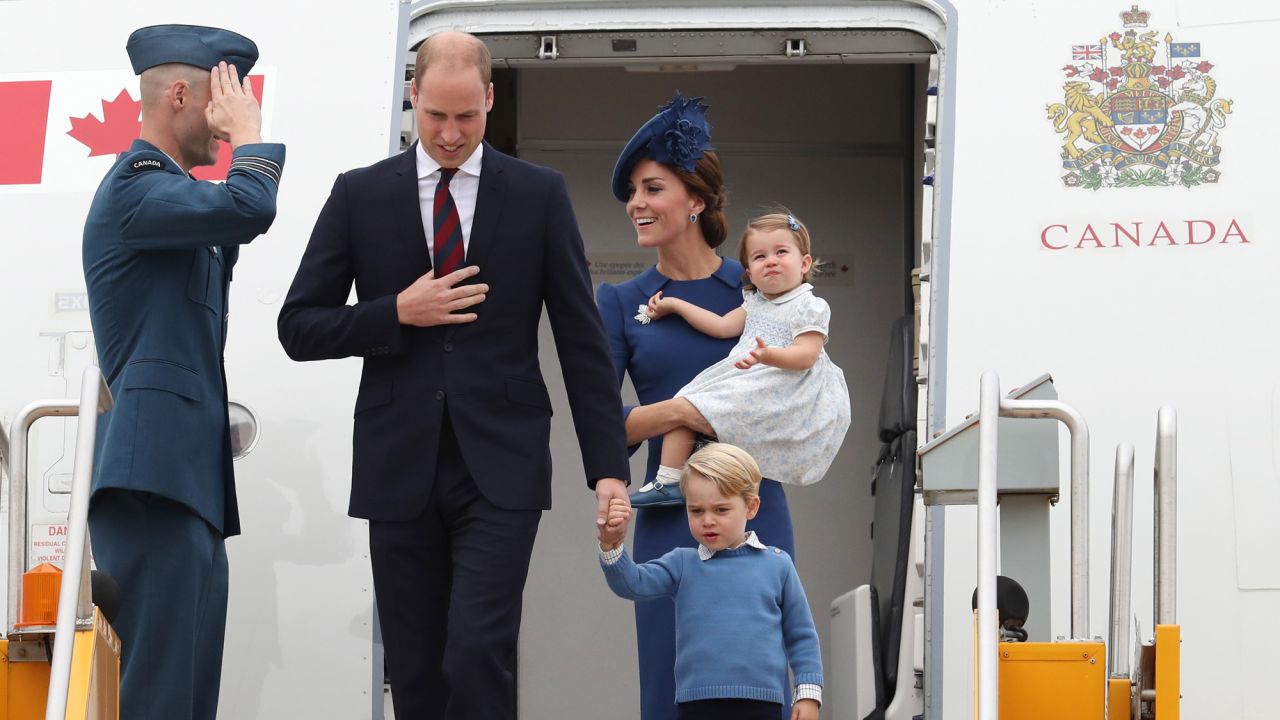 The royal couple and their two children arrive at the Victoria airport on September 24.